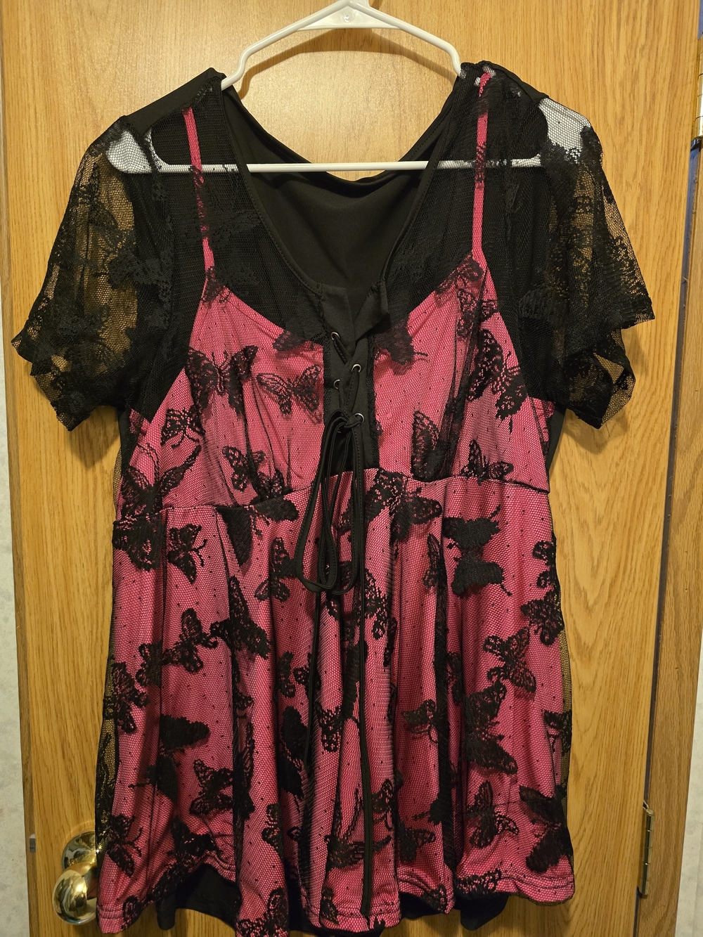 Vibrant Hot Pink Polyester Top with Black Overlock Trim